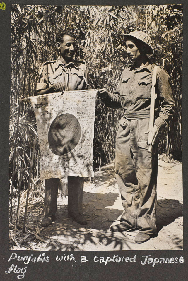 'Punjabis with a captured Japanese flag', Arakan, 1945 (c)
