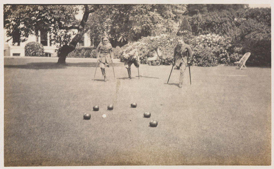 Amputees playing bowls during convalescence in the gardens of Dover House in 1918