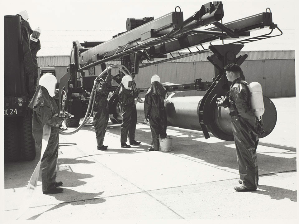 Soldiers fuelling a Corporal missile, 1957