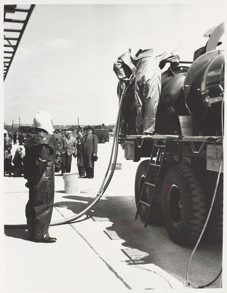 Soldiers fuelling a Corporal missile, 1957