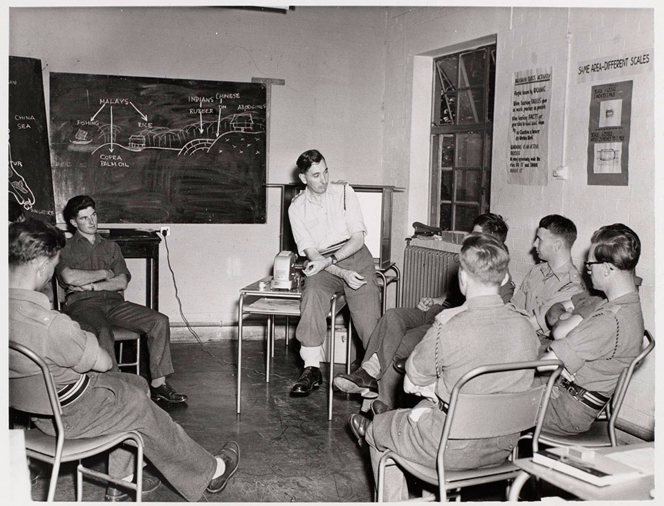 A Royal Army Education Corps officer instructs soldiers, 1955 (c)