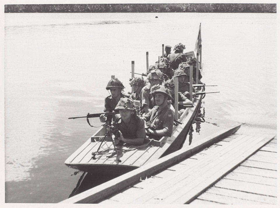 Members of 1st Battalion The Queen's Own Highlanders on a river patrol in Brunei, 1962