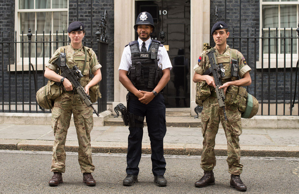 Soldiers of The King's Troop, Royal Horse Artillery on security duty at 10 Downing Street alongside officer of the Metropolitan Police, Operation TEMPERER, 29 May 2017