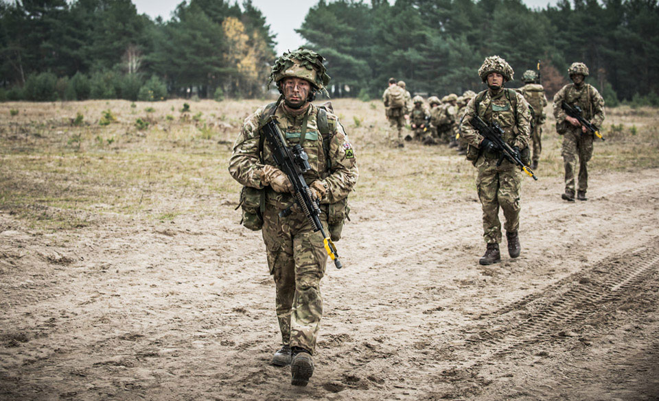 Soldiers of the Royal Welsh infantry regiment, King's Royal Hussars Battle Group, on Exercise BLACK EAGLE, Poland, 2014