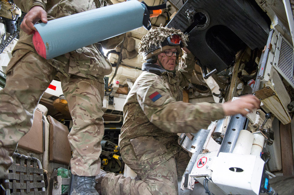 The crew of an AS90 self-propelled gun training with live ammunition, Otterburn Training Area, North Yorkshire, 2015