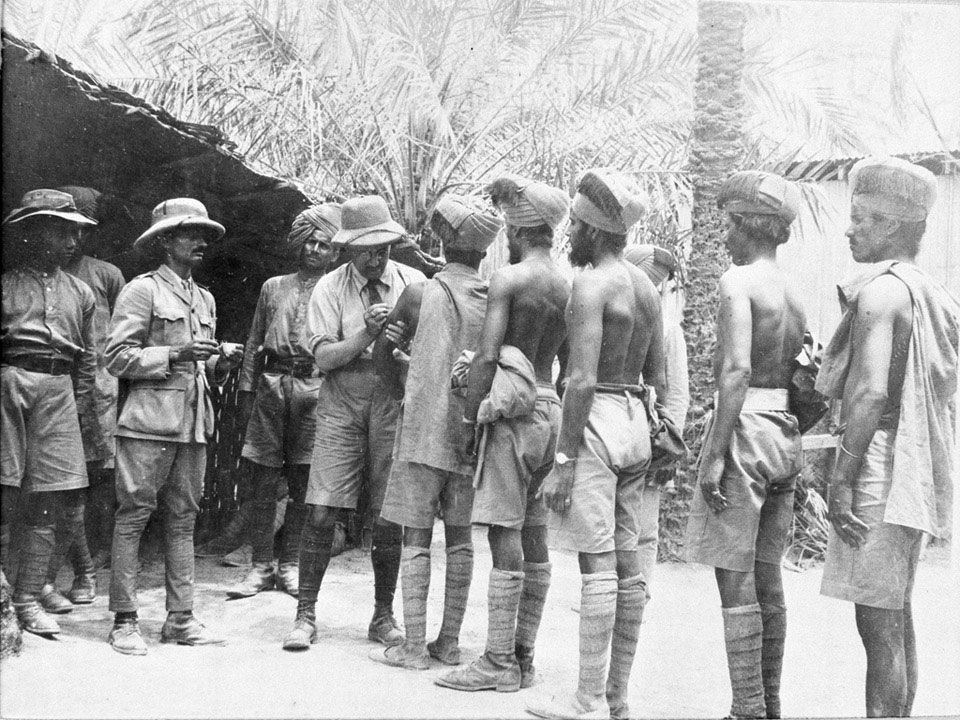 Indian troops lined up to receive inoculations, 1916 (c)