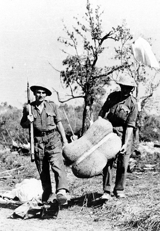 British troops collecting air-dropped supplies, 'Admin Box', Burma, February 1944