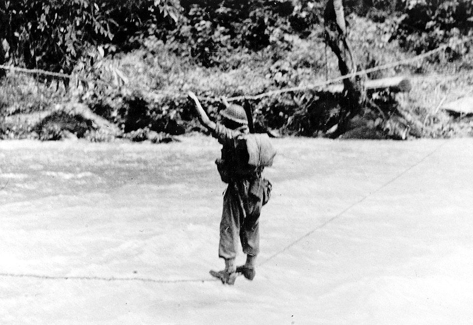 A soldier of 23rd Indian Division crosses a rope-bridge near Sobong in ...
