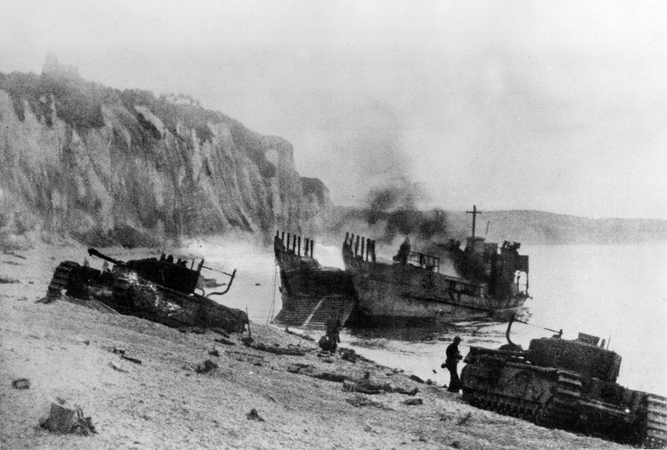 Burning British tank landing vessel and damaged tank, Dieppe, August 1942