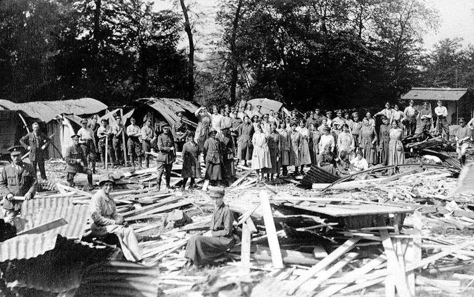 Members of the Queen Mary's Army Auxiliary Corps clearing up after an air raid at Abbeville, May 1918