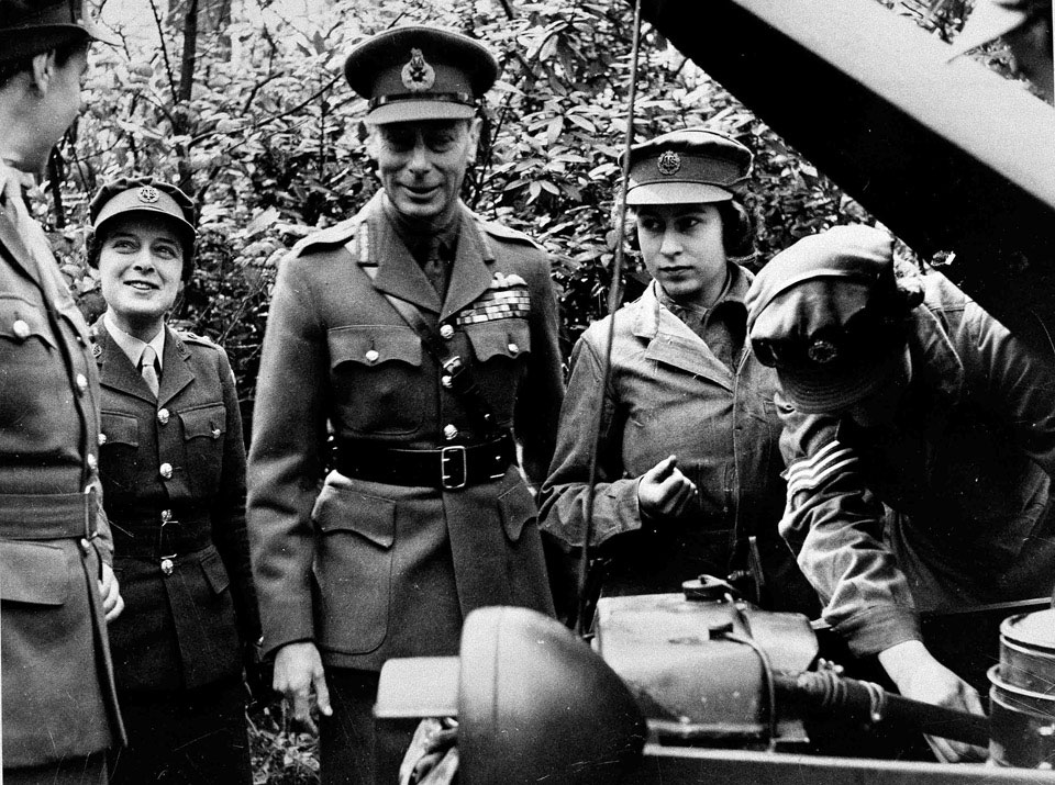 King George VI during a visit to the Auxiliary Territorial Service ...