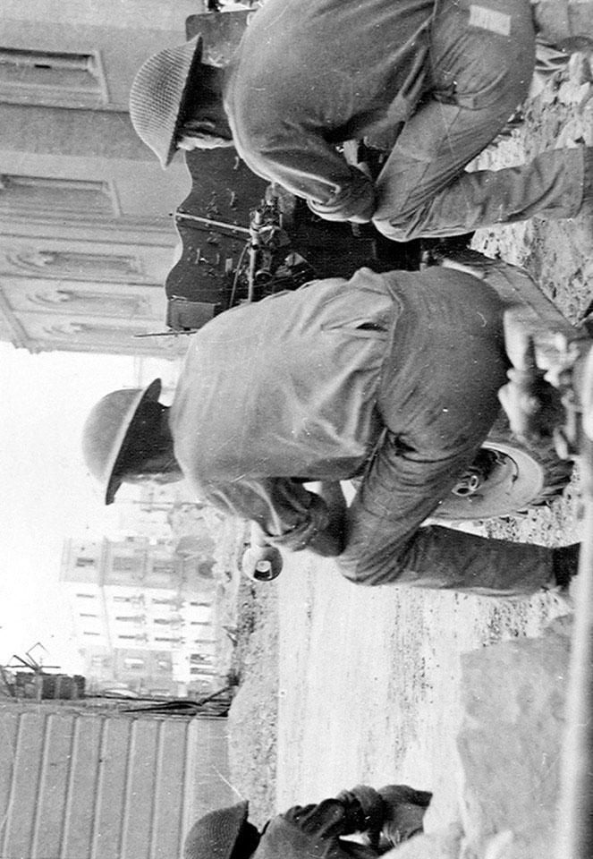 The crew of a six-pounder anti-tank gun covering a road in the ruins of Salerno, Italy, September 1943