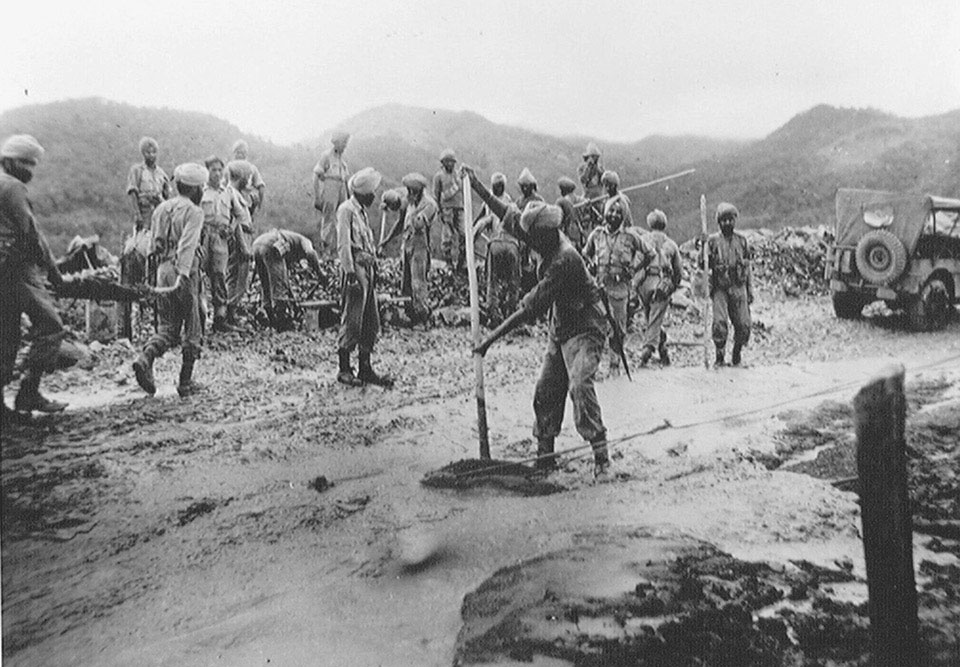 Bengal Sappers and Miners repairing a road near Tamu, 1944 