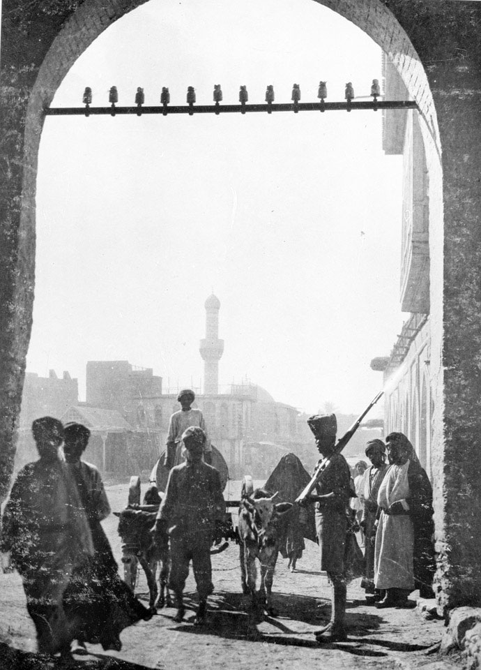 A sepoy guarding a gateway, Baghdad, 1917