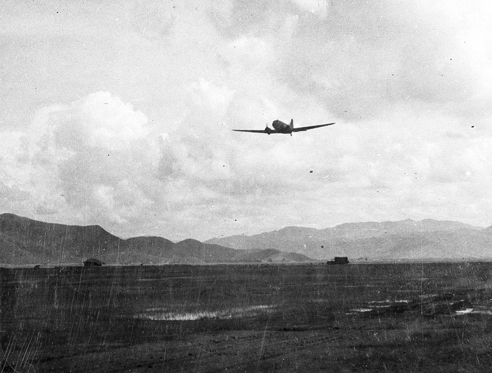 A C47 Dakota dropping supplies on Palel airstrip, Burma, 1944 (c)
